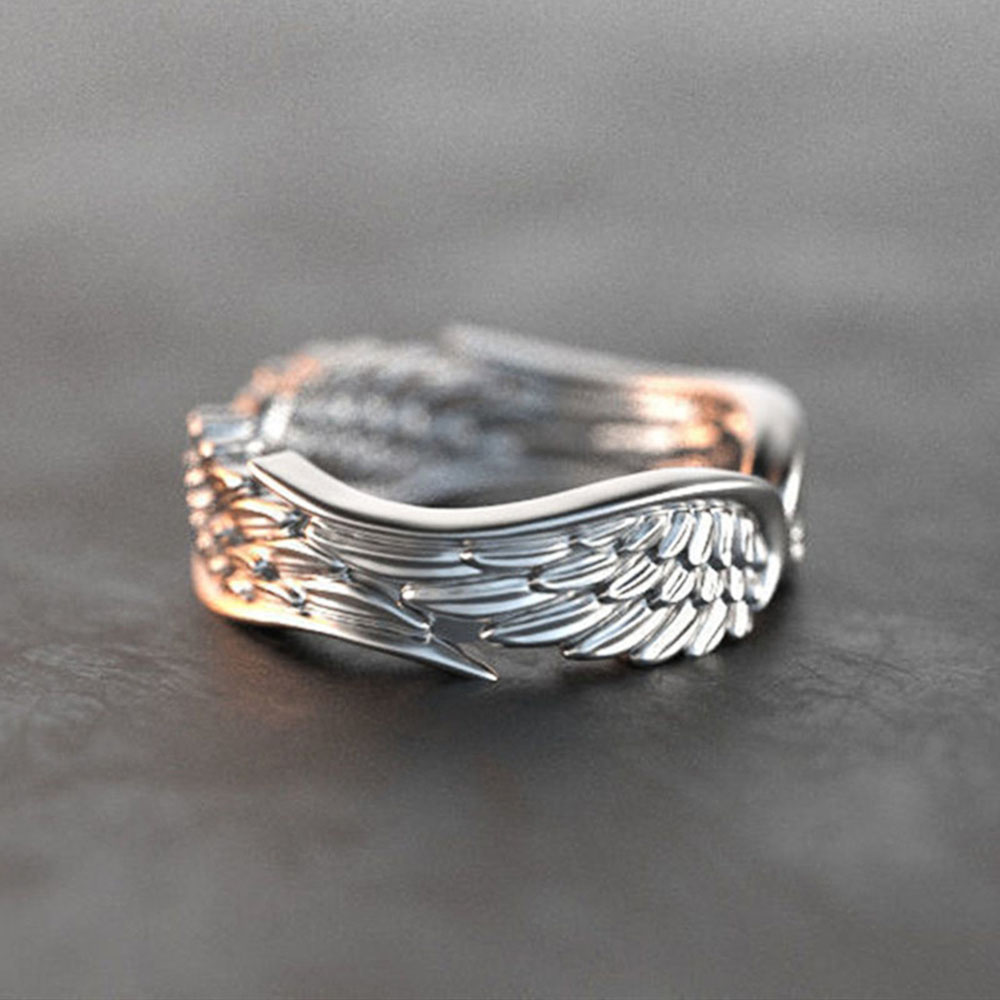Ring med strålande ängel
