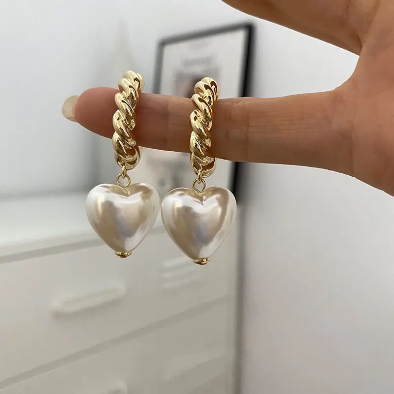 Eleganta örhängen med pärlhjärta