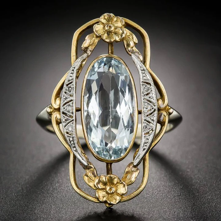 Vintage ring i guld med blå zirkonia