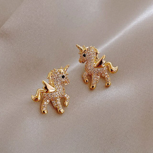 Eleganta glänsande enhörningsörhängen