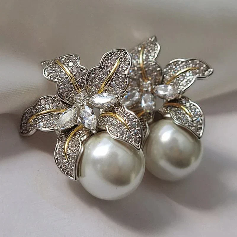 Eleganta blomörhängen med pärlor